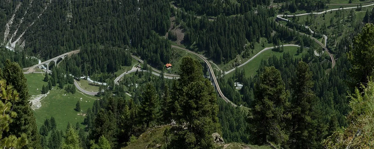Aerial view of the Albula railway viaducts and the looping pass road
